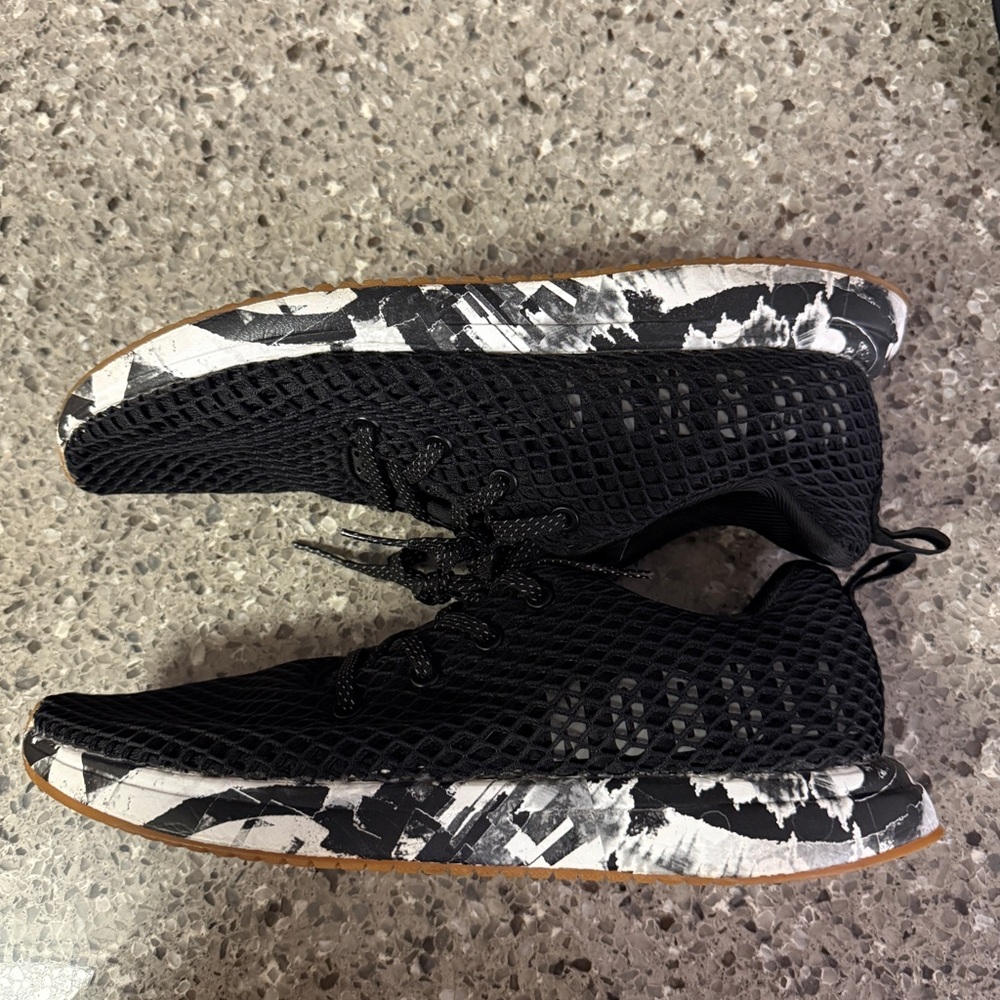 Black and white nobull shoes